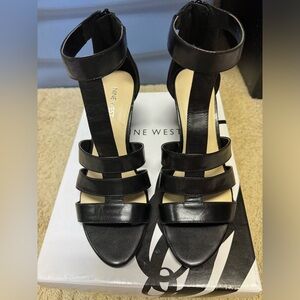 Nine West ankle high black sandals with back zipper. Size 8.